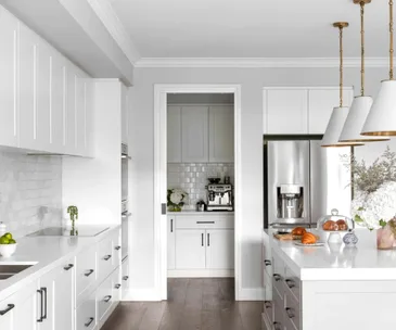image of kitchen with coffee machine and fridge