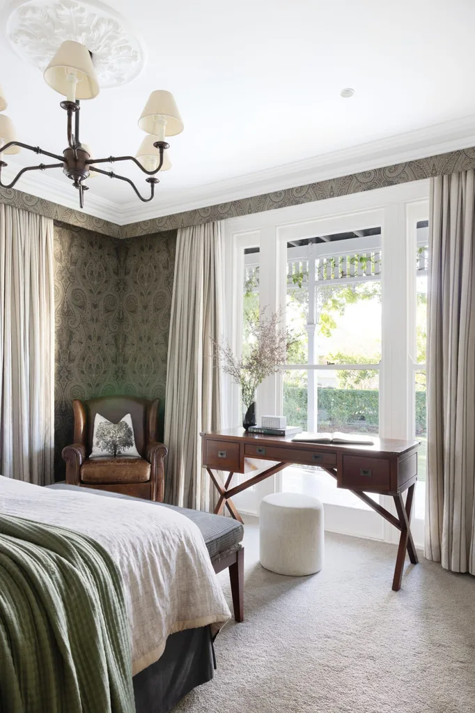 The bedroom inside a historical brisbane home.